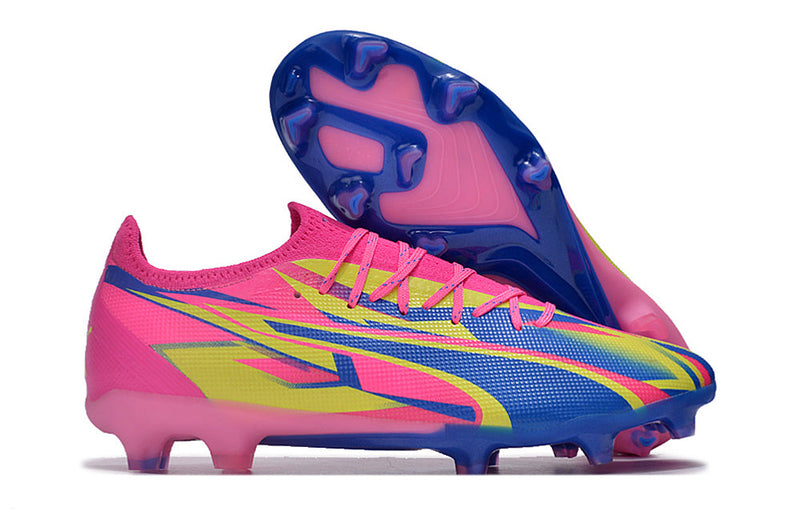 Chuteira Campo Puma Ultra Ultimate FG Rosa, Azul e Amarelo "Energy Pack"