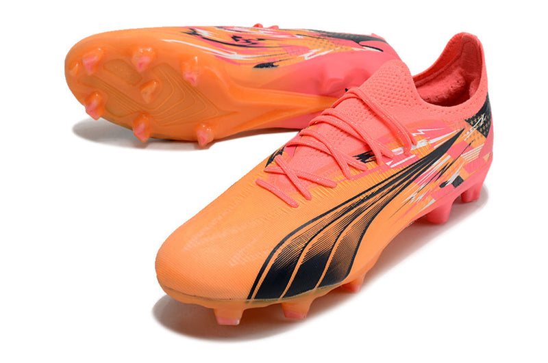 Chuteira Campo Puma Ultra Ultimate FG Laranja e Rosa "Pulisic"