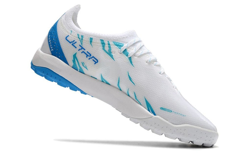 Chuteira Society Puma Ultra Ultimate 1.4 TF Branca e Azul