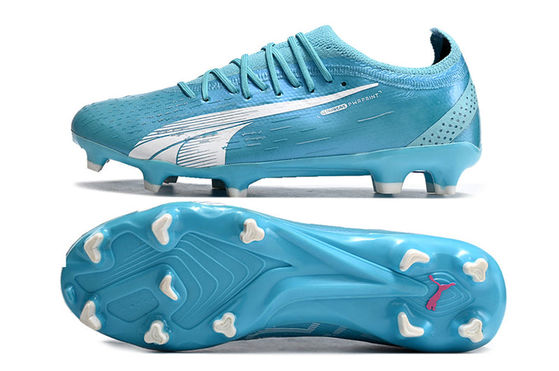 Chuteira Campo Puma Ultra Ultimate 1.4 FG Azul e Rosa "Tricks Pack"