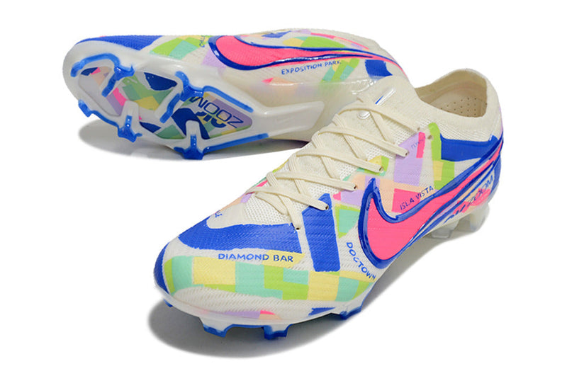 Chuteira Campo Nike Air Zoom Mercurial Vapor 15 Elite FG Branco, Azul e Rosa