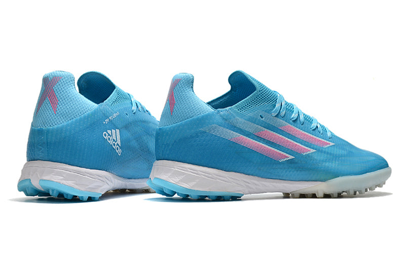 Chuteira Society Adidas X Speedflow.1 TF Azul e Rosa "Sapphire Edge Pack"