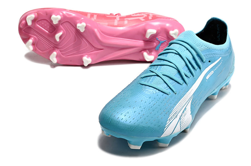 Chuteira Campo Puma Ultra Ultimate 1.4 FG Azul e Rosa "Tricks Pack"