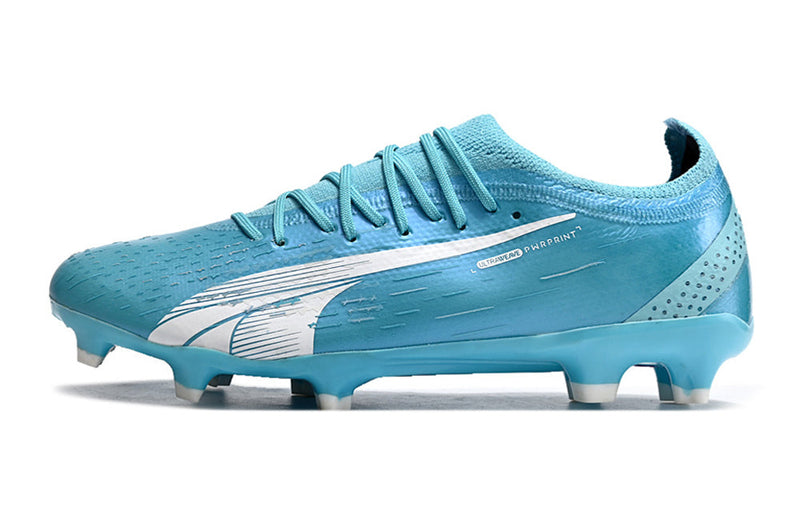 Chuteira Campo Puma Ultra Ultimate 1.4 FG Azul e Rosa "Tricks Pack"