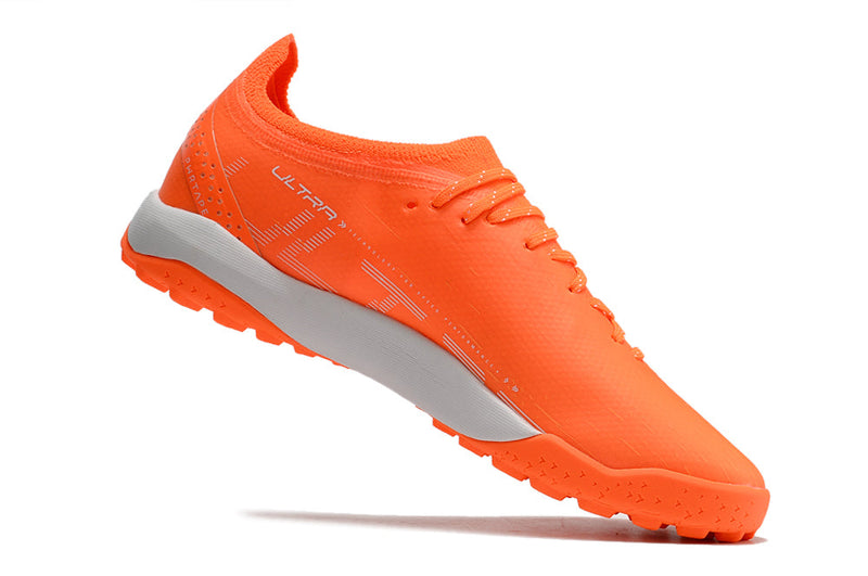 Chuteira Society Puma Ultra Ultimate 1.4 TF Laranja "Supercharge Pack"