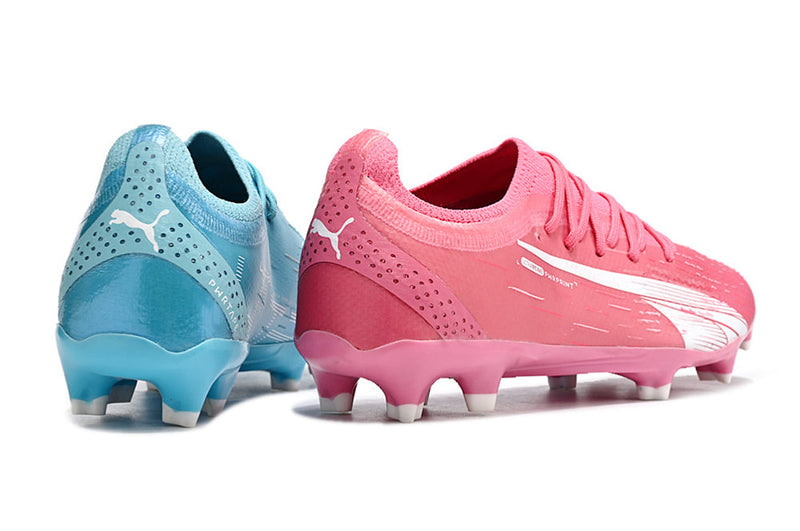 Chuteira Campo Puma Ultra Ultimate 1.4 FG Azul e Rosa "Tricks Pack"