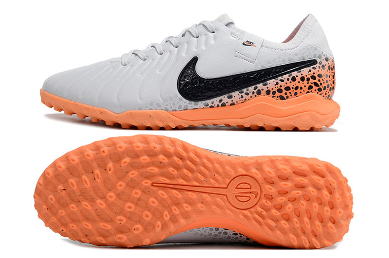 Chuteira Society Nike Tiempo Legend 10 Pro TF Branca, Preta e Laranja "Electric Pack"