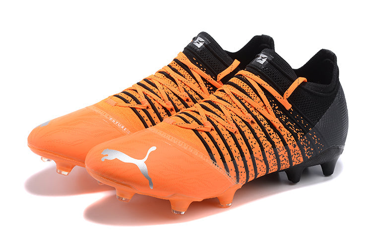 Chuteira Campo Puma Future Z 1.3 FG Laranja e Preta "Instinct Pack"