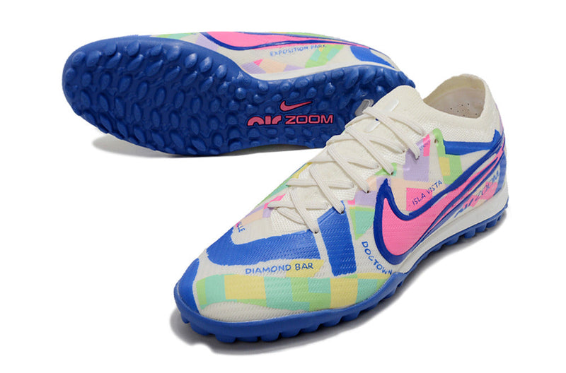 Chuteira Society Nike Air Zoom Mercurial Vapor 15 Elite TF Branca, Azul e Rosa "SoCal Pack"