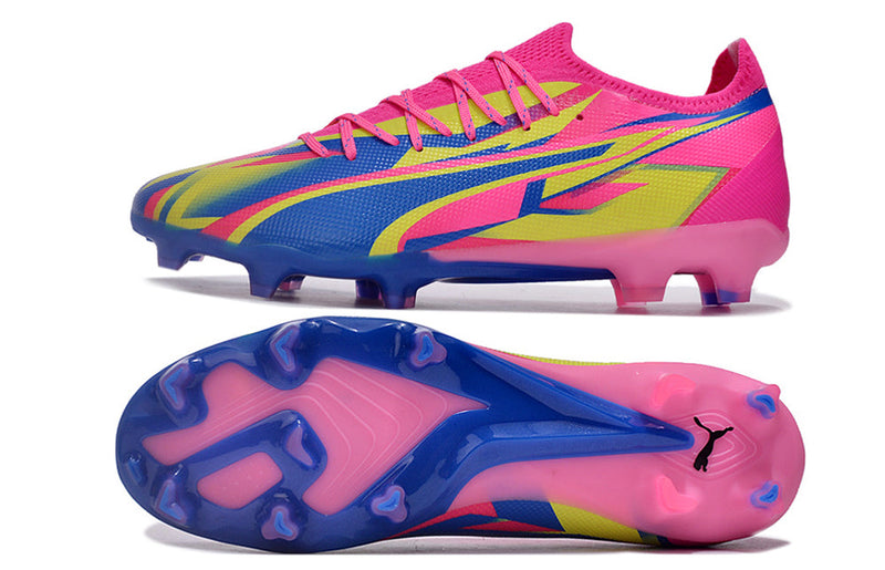 Chuteira Campo Puma Ultra Ultimate FG Rosa, Azul e Amarelo "Energy Pack"